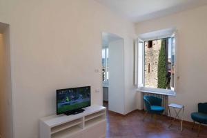 TV a/nebo společenská místnost v ubytování Secret Window