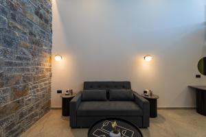 Posezení v ubytování EcoHeaven Suites