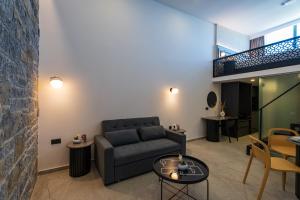 Posezení v ubytování EcoHeaven Suites