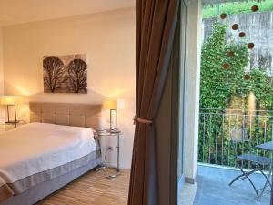 Posteľ alebo postele v izbe v ubytovaní Residenza I Melograni - Suite