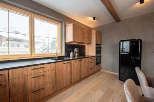 Η κουζίνα ή μικρή κουζίνα στο Filzsteinresort Wohnungen Top 4 +6 φωτογραφίες