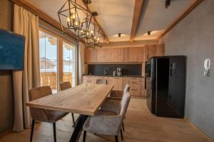 Kuchyň nebo kuchyňský kout v ubytování Filzsteinresort Wohnungen Top 7