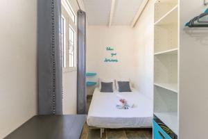 Un pat sau paturi într-o cameră la Maison confortable à Saint-François 40 m² avec piscine partagée