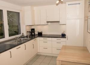 Kuchyň nebo kuchyňský kout v ubytování Ferienwohnung Kanalblick