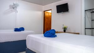 Postel nebo postele na pokoji v ubytování Playa Negra Home's CR
