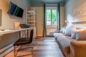 TV a/nebo společenská místnost v ubytování Gian Paul Hotel