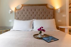 Voodi või voodid majutusasutuse Gian Paul Hotel toas
