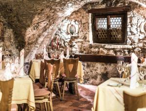 A restaurant or other place to eat at Salzburg Hotel Holznerwirt