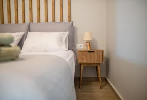 Un pat sau paturi într-o cameră la Casa Irene