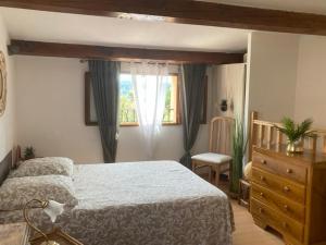 Ένα ή περισσότερα κρεβάτια σε δωμάτιο στο Lou pitchoune