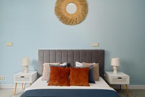 En eller flere senger på et rom på AS HOME Apartamenty Rynek 50 R503