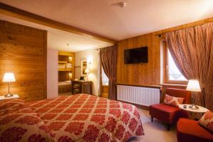 Postel nebo postele na pokoji v ubytování Hotel Ruitor