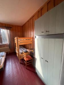 Postel nebo postele na pokoji v ubytování Horská Chata Gírová
