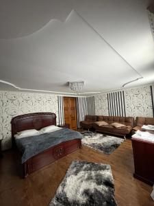Postel nebo postele na pokoji v ubytování Guest House Misho