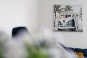 a reflection of a van in a mirror at Victoria Apartments in Skegness