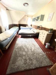 Postel nebo postele na pokoji v ubytování Horská Chata Gírová