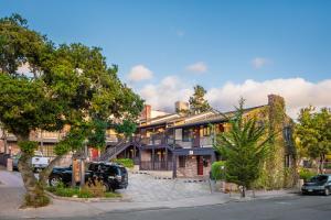 a building with a truck parked in front of it at Wayside Inn in Carmel