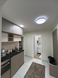 a kitchen with a sink and a stove at Paradiso1 in Vračar (historical)