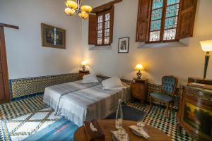 Letto o letti in una camera di Ryad Mabrouka