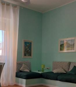 מיטה או מיטות בחדר ב-Appartamento MareBello