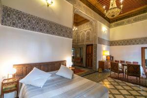 Letto o letti in una camera di Ryad Mabrouka