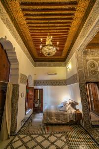 Letto o letti in una camera di Ryad Mabrouka