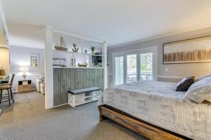 a bedroom with a bed and a desk and a chair at Norwich Vacation Rental with Golf Course Views! in Norwich +23 photos