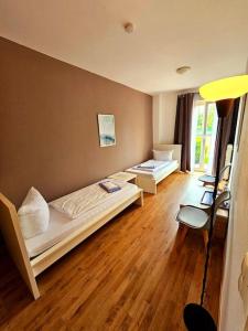 Postel nebo postele na pokoji v ubytování Apartment 7-10