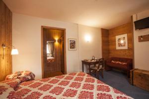 Postel nebo postele na pokoji v ubytování Hotel Ruitor