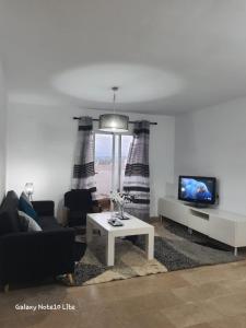 TV a/nebo společenská místnost v ubytování Manilva chill + 6 fotografií