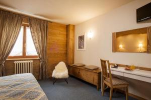 Postel nebo postele na pokoji v ubytování Hotel Ruitor