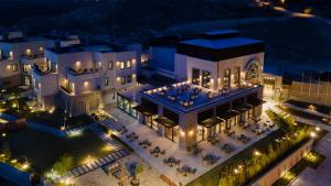 an aerial view of a building at night at Alden Hotel Cappadocia in Urgup