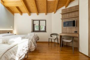 Posteľ alebo postele v izbe v ubytovaní Apartment Tamara Suite - Menaggio