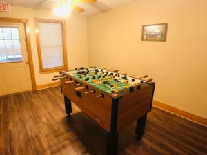 a large foosball table in a room at Briarstone Lodge Condo 13D by Eden Crest in Pigeon Forge