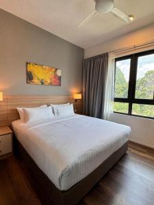 Postel nebo postele na pokoji v ubytování Sunway Onsen Suite