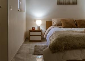 Cama o camas de una habitación en Malta Serenity Home