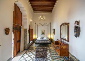 Letto o letti in una camera di Ryad Mabrouka
