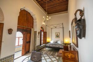 Letto o letti in una camera di Ryad Mabrouka