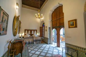 Letto o letti in una camera di Ryad Mabrouka