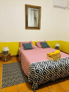 Ένα ή περισσότερα κρεβάτια σε δωμάτιο στο Les Tuiles Rouges