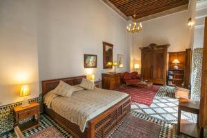 Letto o letti in una camera di Ryad Mabrouka