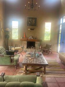 Posezení v ubytování Casa de Campo Guayabo Chincha