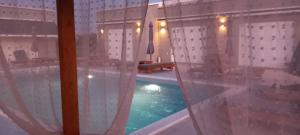 Bazén v ubytování Olympia Suites nebo v jeho okolí