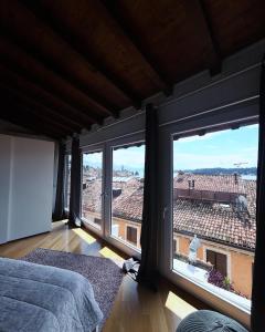 A bed or beds in a room at La casa di Angelina