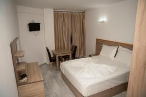Postel nebo postele na pokoji v ubytování Hotel Pernoca