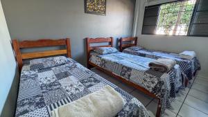 Katil atau katil-katil dalam bilik di Pling Hotel