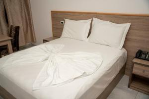 Postel nebo postele na pokoji v ubytování Hotel Pernoca