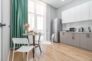 Η κουζίνα ή μικρή κουζίνα στο Apartment near Astana Arena, EXPO 2017