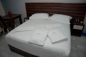 Postel nebo postele na pokoji v ubytování Hotel Pernoca