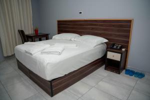 Postel nebo postele na pokoji v ubytování Hotel Pernoca